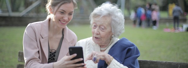 cheerful-senior-mother-and-adult-daughter-using-smartphone-3791664.jpg